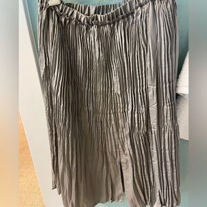 Sundance, grey skirt.